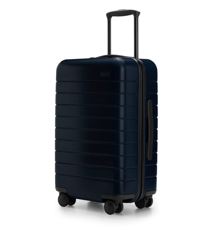 Away squeezes a bit more space out of its popular carry-on luggage ...